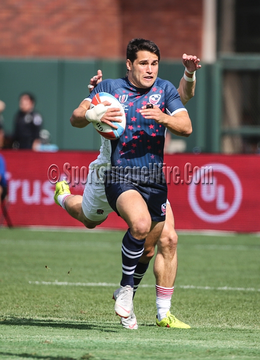 2018RugbySevensSat-29.JPG - United States player Madison Hughes scores a try against England in the men's championship quarter finals of the 2018 Rugby World Cup Sevens, Saturday, July 21, 2018, at AT&T Park, San Francisco. England defeated USA 24-19 in sudden death play. (Spencer Allen/IOS via AP)